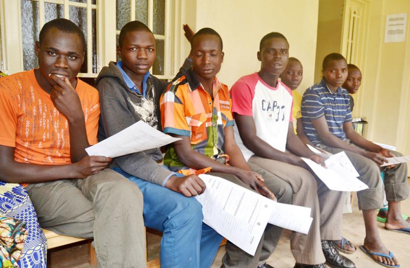 Some of men await circumcision in Burera district on Monday. (Jean du00e2u20acu2122Amour Mbonyinshuti)