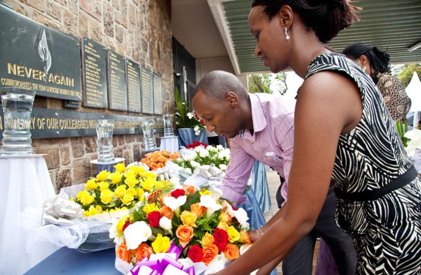 Relatives of former UN staff Genocide victims lay a wreath during at a past memorial. (File)