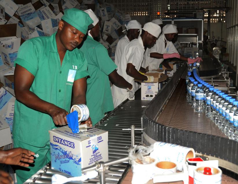 Workers at Inyange factory; Manufacturers will be seeking to market their products during the  Poland-Africa trade congress. (File.)