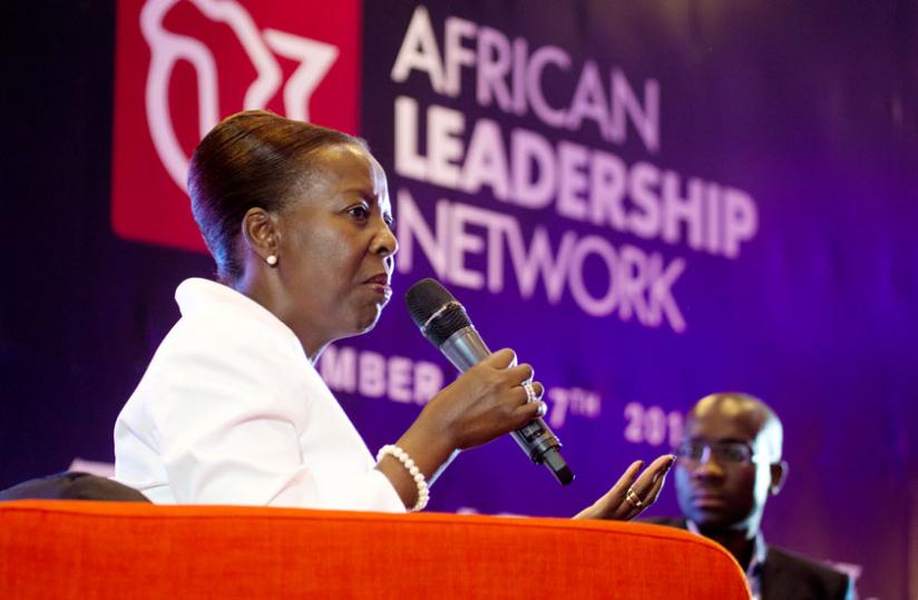 Mushikiwabo (L), together with Aca Leke, one of the founder members of African Leadership Network, during the symposium in Kigali yesterday. (Timothy Kisambira)