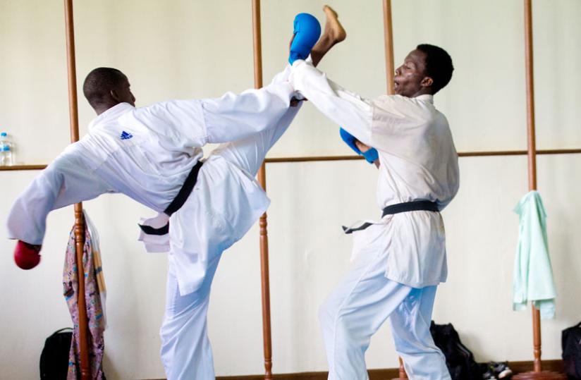 Vanily Ngarambe and Emery Espoir Ntungane were hoping for the best after a three week training stint with Tamer Abdel-Raouf, a highly rated Egyptian Karate coach. (Timothy Kisambira)