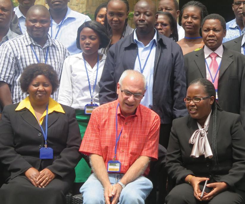 Mukeshimana (front, right) poses for a group photo with AGRA trainers and participants after the conference. (Solomon Asaba)
