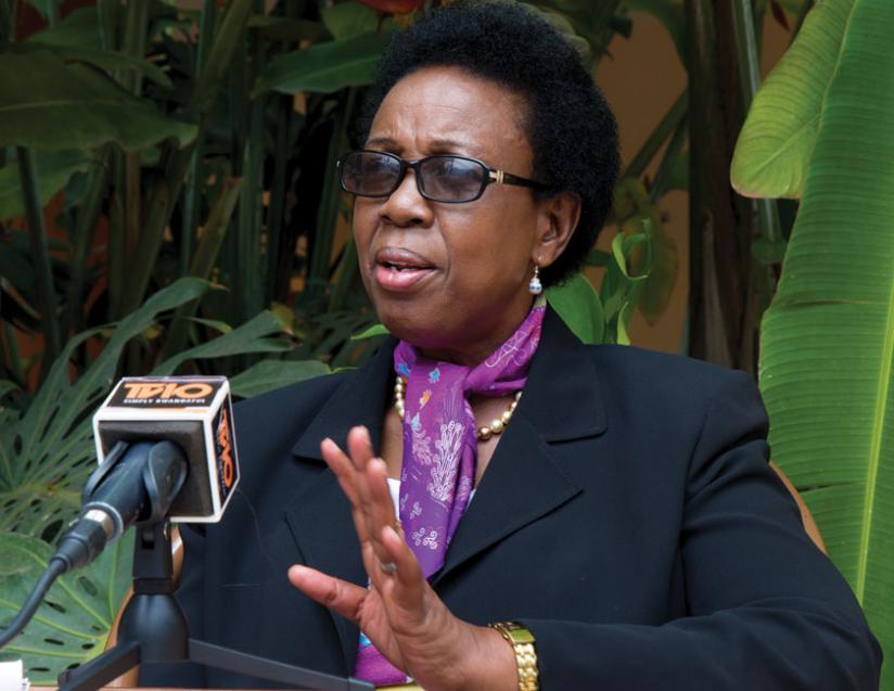 Tumusiime addresses reporters in Kigali last week. (Timothy Kisambira)