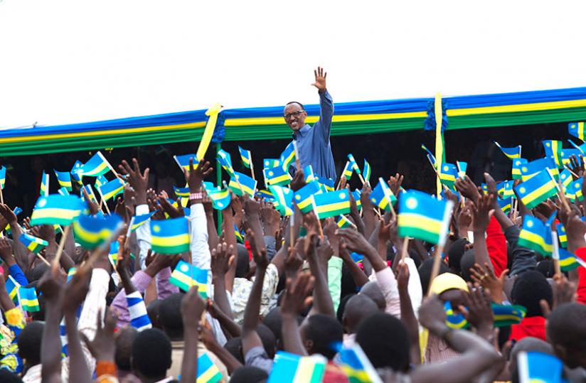 President Kagame waves to the crowd in recognition of the warm reception he received at Jabana in Gasabo District yesterday. (Village Urugwiro)
