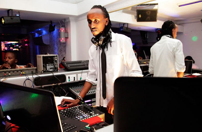 A Deejay plays music in one of the licensed night clubs in Kigali. (File)