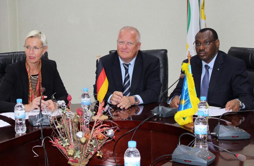 L-R; Head of the German delegation, Gudrun Grosse Wiesmann, German Ambassador to Rwanda Peter Fahrenholtz, and  Finance minister Amb. Claver Gatete at the meeting yesterday. (Courtesy)