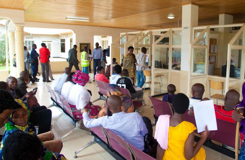 Patients at Kacyiru Police Hospital wait for service recently.(File)