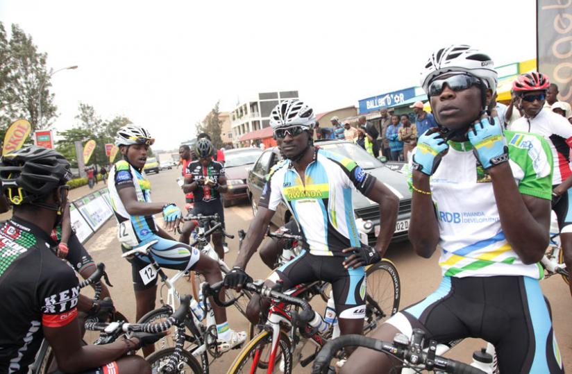 Rwandan Cyclists get ready for a race during last year's Tour du Rwanda. Team Rwanda Coach Jonathan Boyer expects more podium wins in this year's race. (File photo)