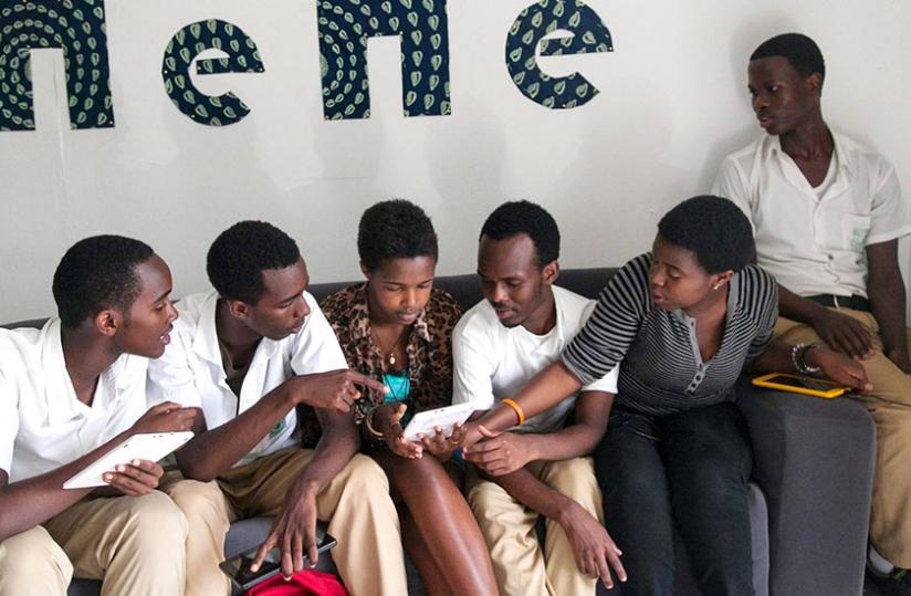 Sharing ideas on what is the correct answer using the apps. (Patrick Buchana)