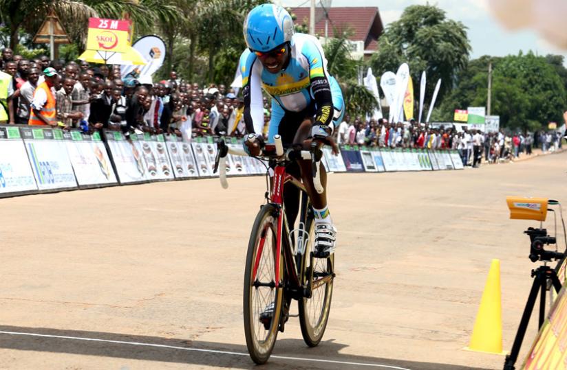 Hadi races to the finish line to win the prologue of the Tour of Rwanda yesterday. (John Mbanda)