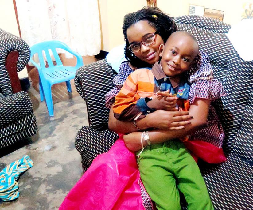 Mukabacondo with her son Kenzo at their home. (Donah Mbabazi)