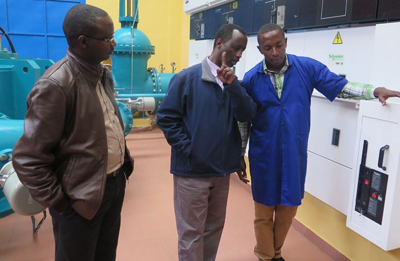 Kanyankole (C) tours  Giciye power plant in Nyabihu  District over the weekend. (Peterson Tumwebaze)