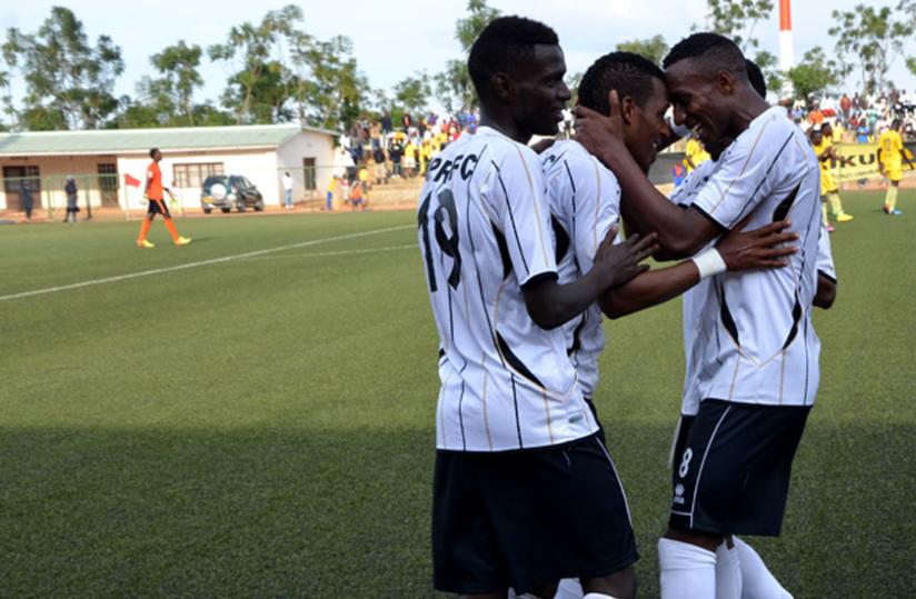 APR players celebrate the first goal scored by striker Patrick Sibomana (M). (Samuel Ngendahimana)