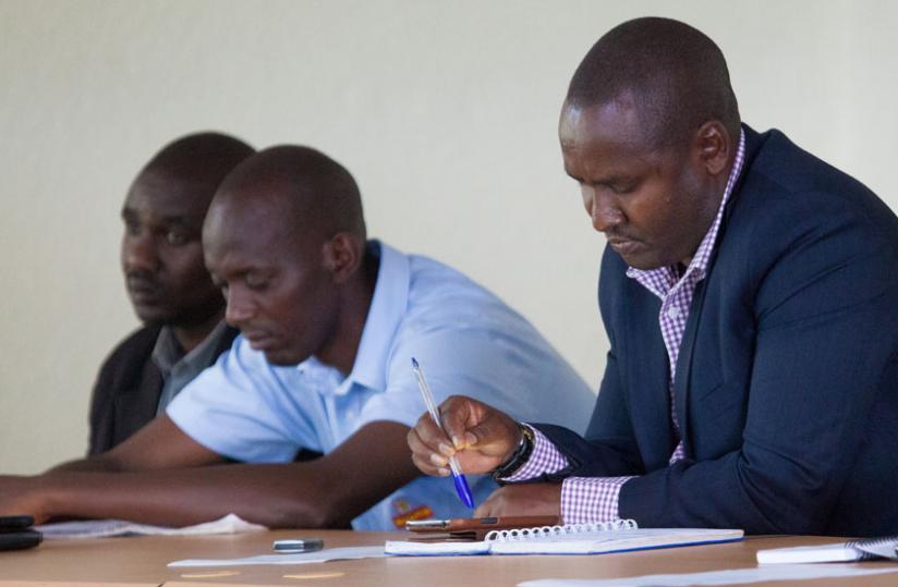 Ndizeye (R) during a function on October 8. (Timothy Kisambira)