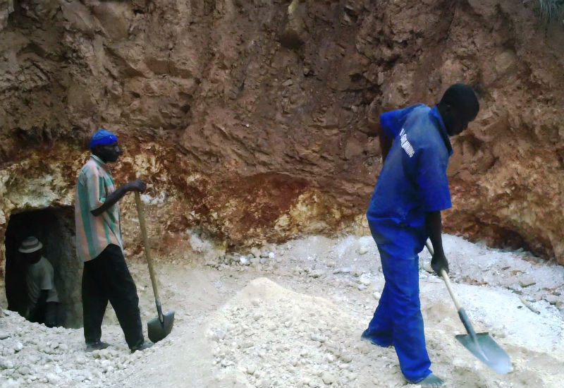Miners working outside the Gakenke mine where three miners lost their lives. J Mbonyinshuti  