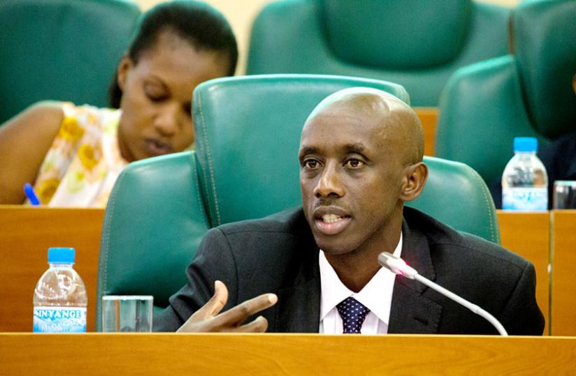 Kaboneka responds to queries from senators at Parliament yesterday. (Timothy Kisambira)