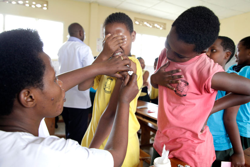 School girls get immunised against cervical cancer in 2012. (File)