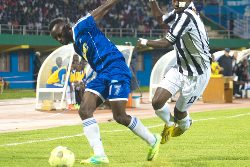 APR defender  Ismael Nshutiyamagara tries to stop Rayon Sportu00e2u20acu2122s Peter Otema during their clash recently. A Rayon Sport win will take them top of the league table today after APRu00e2u20acu2122s defeat yesterday. rn(Timothy Kisambira)