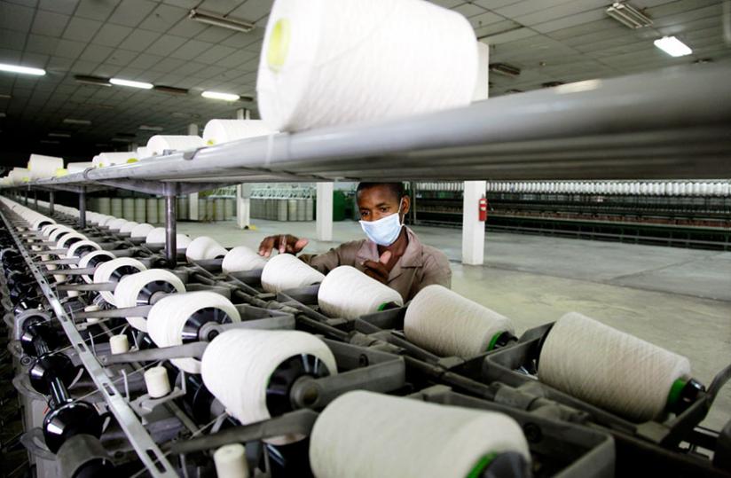 A worker at a textile factory in Kigali. Strategies are underway to reduce the import bill by increasing locally made products on domestic market. (File)
