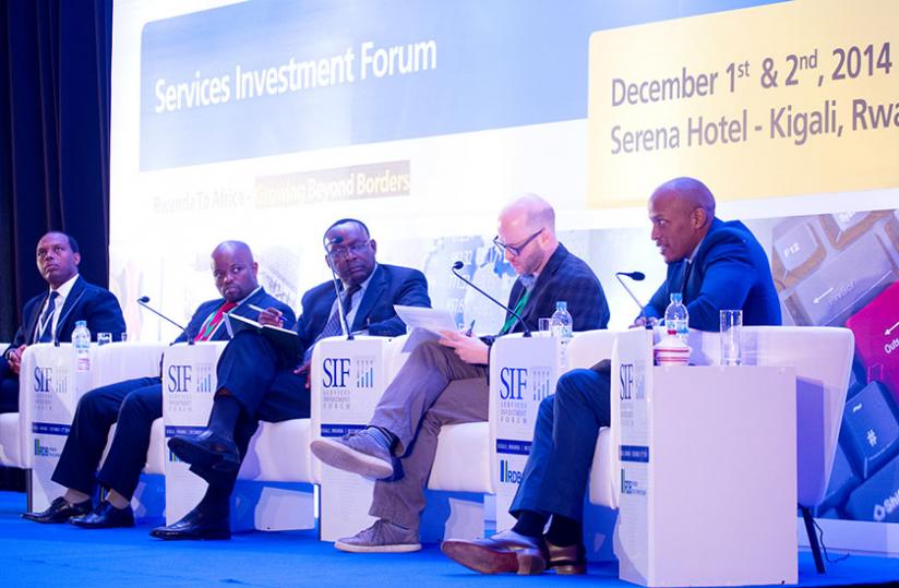 Penelist at the Service Investment Forum from L-R; RDB chief executive Francis Gatare, Youth and ICT minister Jean Philbert Nsengimana, Trade and Industry minister Francois Kanimba (moderator), David Primack, executive director of International Lawyers and Economists Against Poverty, and Konde Bugingo, chief executive of Rwanda Development Banku00e2u20acu2122s commercial section yesterday. (Timothy Kisambira)