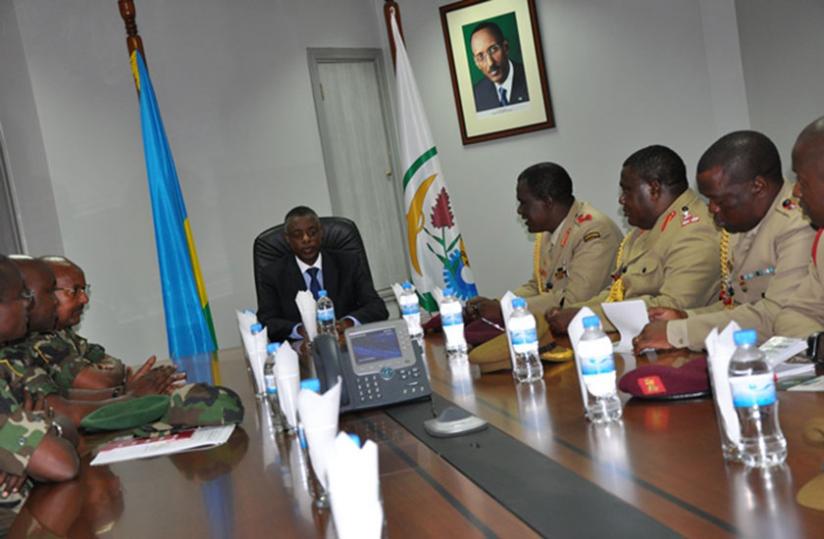 The Malawian delegation (R)  in a meeting with Defence minister James Kabarebe (C) and senior RDF officers at the Ministry of Defence headquarters in Kigali yesterday. (Timothy Kisambira)