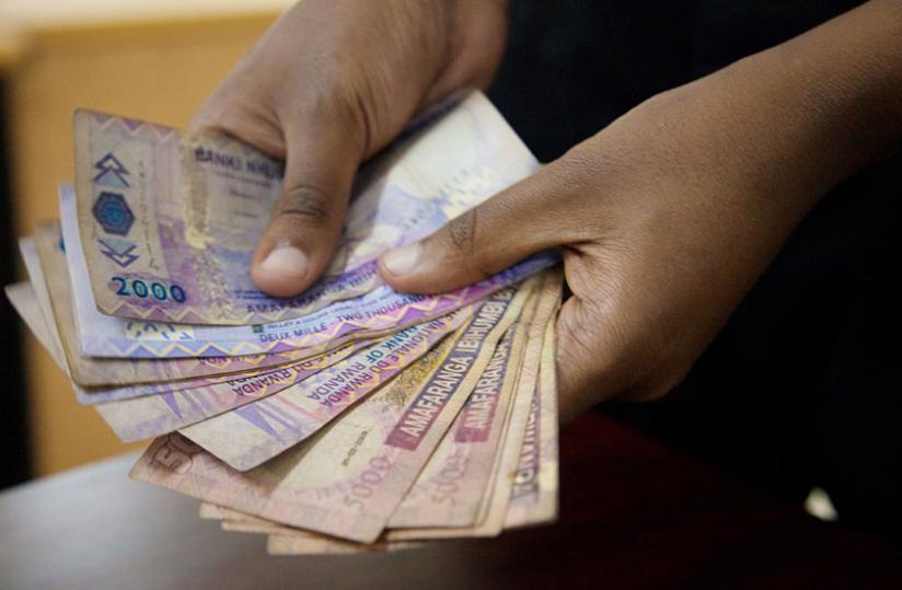 The central bank will print new legal tender to replace old notes. (Doreen Umutesi)