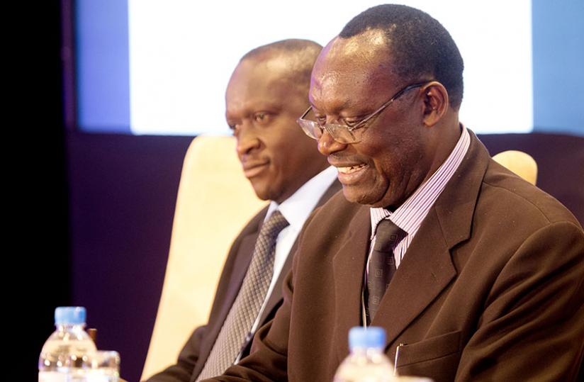 Trade and Industry minister Francois Kanimba (R), together with the Minister for Sports and Culture, Joseph Habineza, address the media after the closing of the Services Investment Forum in Kigali yesterday. (Timothy Kisambira)