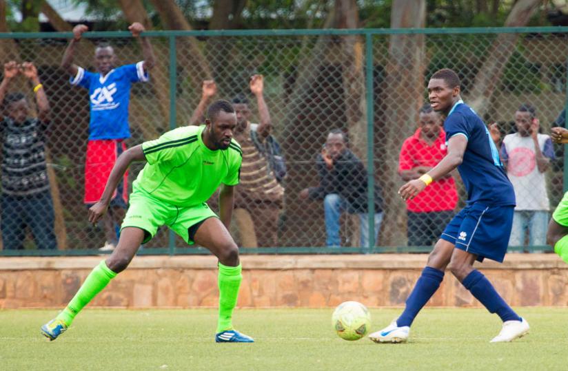 Police striker Eric Sebanani  (in blue) was instrumental in their 5-0 drubbing of Kiyovu in the league. Police need him to contain  Rayon Sports on Saturday. rn(Timothy Kisambira)