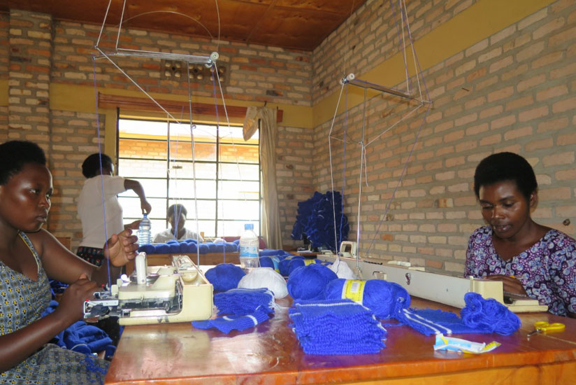Uwimana knits clothes at a knitting workshop that operates at the associationu00e2u20acu2122s head office. (Jean Pierre Bucyensenge)