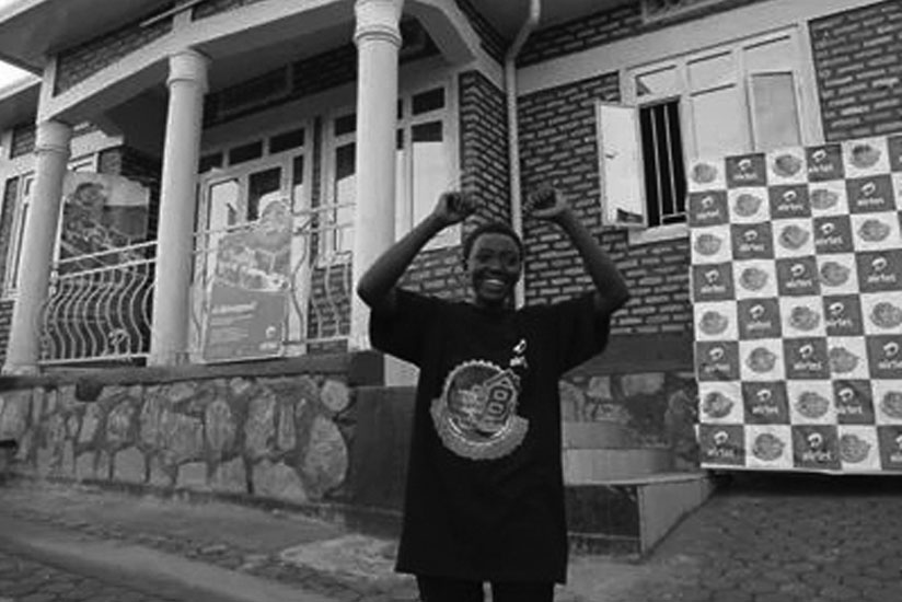 Lucky Girl: Nyinawumuntu celebrates infront of the Rwf20m home she won on Thursday. 