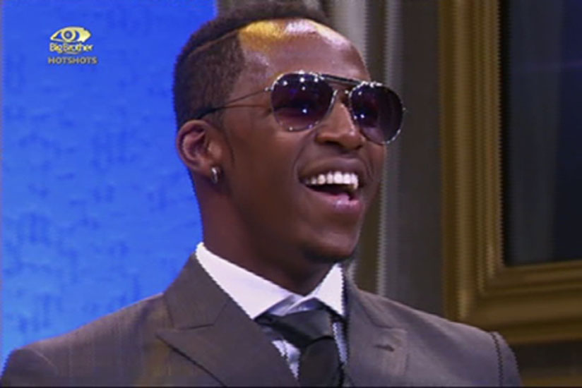 idris smiles after he was announced the winner of Big Brother Hotshots