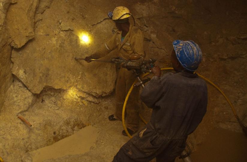 Miners under a tunnel at Gatumba mining centre in Ngororero District.(Timothy Kisambira)