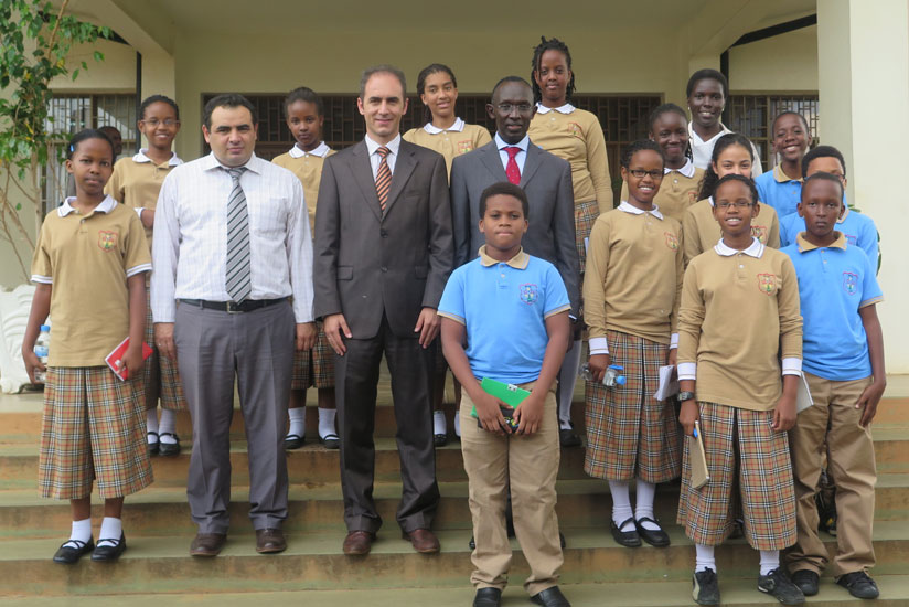 Pupils from Hope Academy Rwanda after meeting Chief Justice Prof. Sam Rugege (wearing red neck tie). Third from left is their headmaster Isa Gokturk Yilmaz flanked by his deputy Sefer Zengin (second left) and teacher Racheal Turigye (top right). 