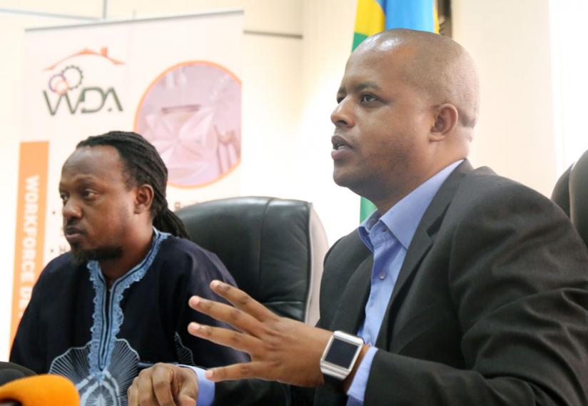 WDA Director General Jerome Gasana (R) and Jacques Muligande a music teacher, at the press conference yesterday. (John Mbanda)