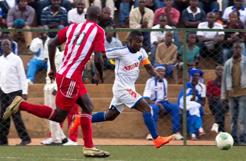 Rayon Sports Captain Fuadi Ndayisenga goes past a Musanze defender in a league tie. The winger is back from injury. (Timothy Kisambira)