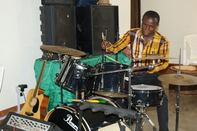 Musafiri doing what he does best, drumming. (Courtesy)
