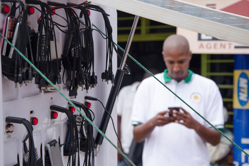 The kiosk has many charging ports. This technology has been well received in Rwanda and Burundi. (Patrick Buchana)