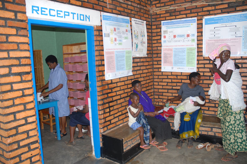 Residents seek medical services from a health centre in Gicumbi District in 2011. Seeking early treatment has reduced malaria incidence significantly. (File)