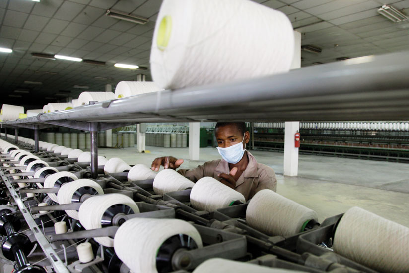 A worker at Texrwa Textiles. East Africa should promote industrial development as it fast-tracks the integration process to reap maximun benefits. (File)