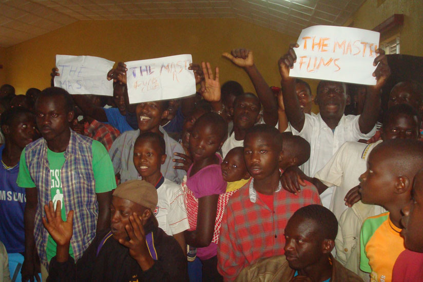 Fans carry placards with the names of their favourite contestants. (Courtesy)