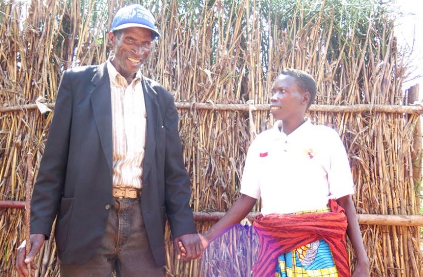 The couple says their union has helped them overcome HIV stigma, improve their lives and lead a happy life. (Jean Pierre Bucyensenge)