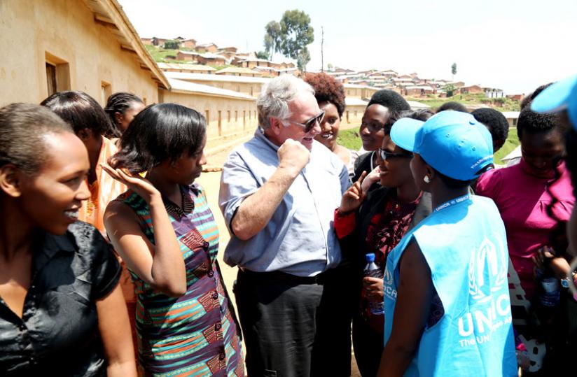 Howard Buffett chats with some of the beneficiaries of Howard G. Buffett Foundation in Gihembe Refugee Camp yesterday. (John Mbanda)