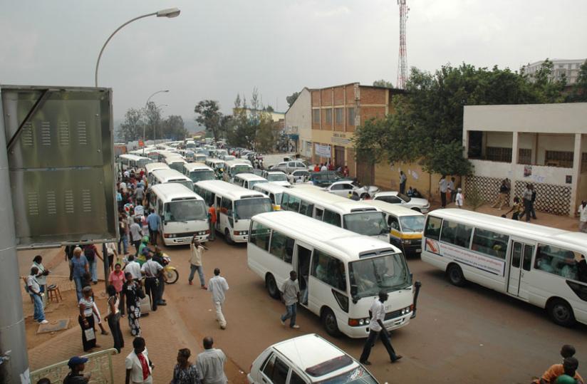 Passengers board omni-buses in Kigali recently.  (File)