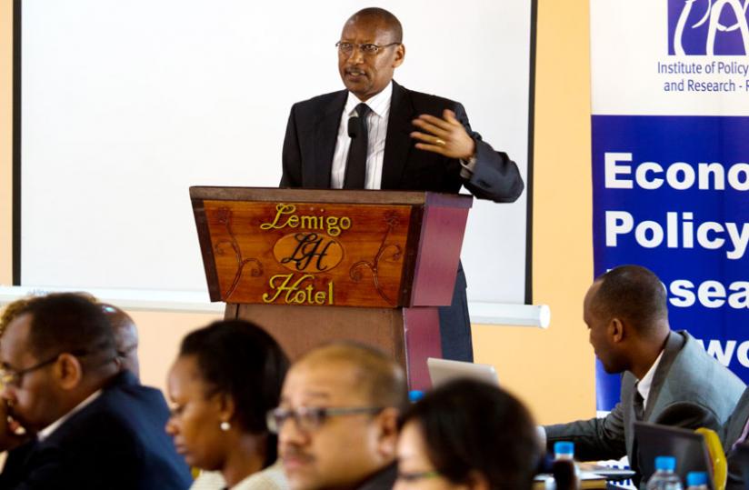 Central bank governor John Rwangombwa gives his opening remarks at the conference in Kigali yesterday. (Timothy Kisambira)