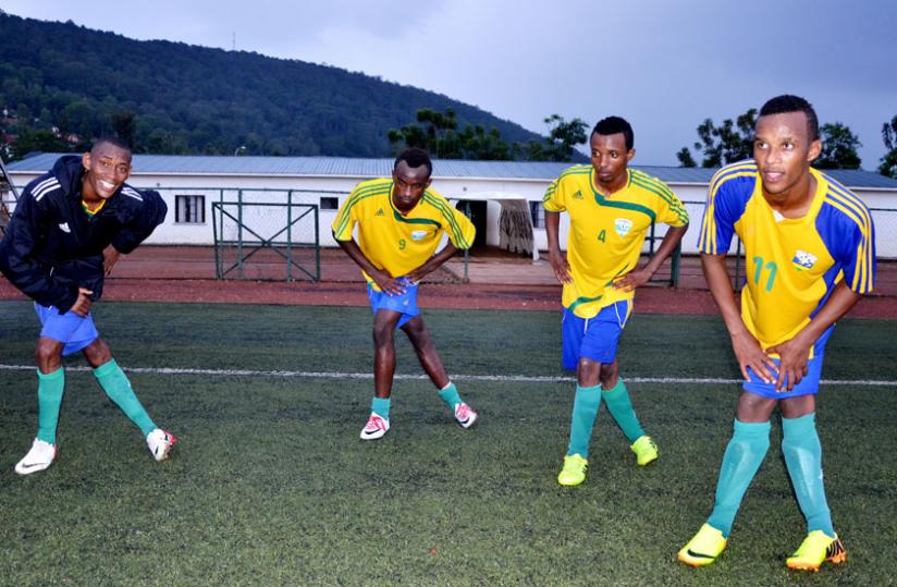 Jean Baptiste Mugiraneza (left) trains with the U23 team yesterday at Kigali regional stadium. (Sam Ngendahimana)