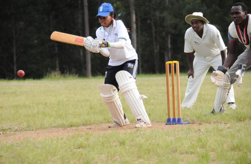 Mary Maina, seen here batting during a charity game at Kicukiro cricket oval. (Courtesy)