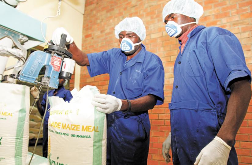 Workers at minimex, a local maize milling factory. (File)