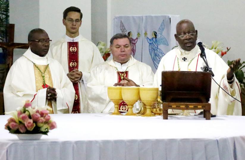 Archbishop Thaddee Ntihinyurwa (R) with the Papal Nuncio Russo  (2nd right) and other clergy lead the mass to celebrate 50 years of Rwanda- Vatican relations at St Michel Cathedral. (John Mbanda)
