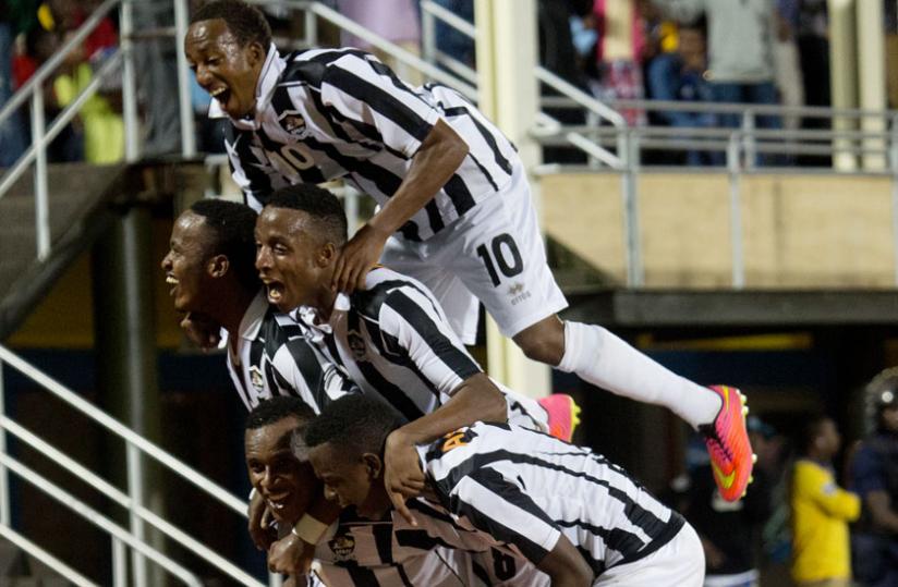 APR players celebrate after a recent league victory. The league leaders thrashed Kiyovu 5-0 to maintain a 3 point lead in the National Football League. (Timothy Kisambira)