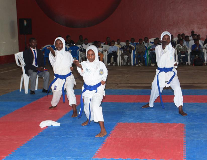 The female Kata team of Kagugu-based Flying Eagle Karate club competing in the Japan Ambassador Cup early this year. (Courtesy)
